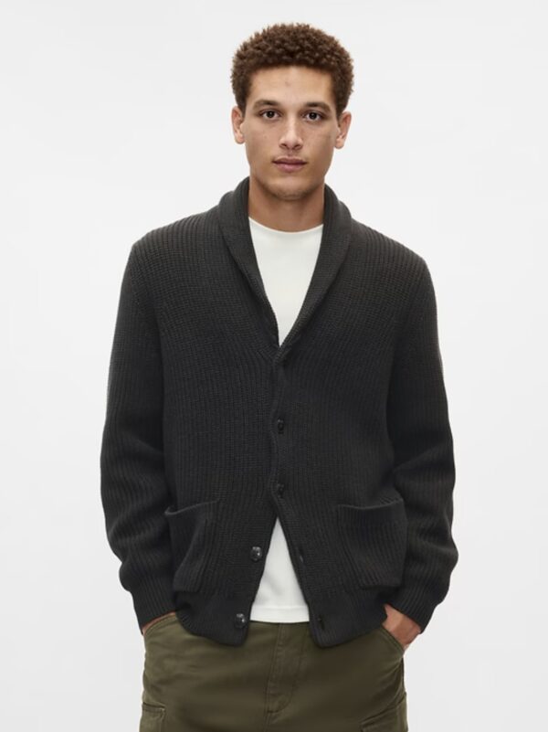 man wearing a shawl collar cardigan sweater over a crew neck shirt