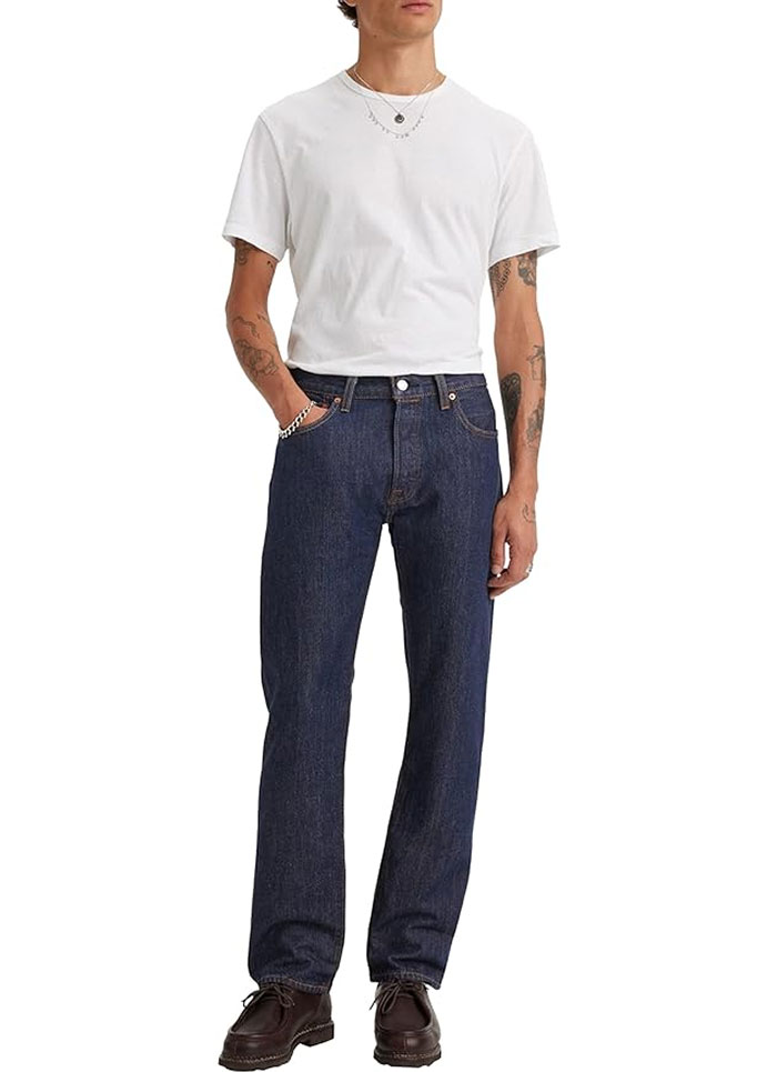 man wearing dark rinse 501