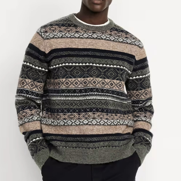 a man wearing a fair isle pattered sweater
