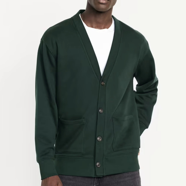 a man wearing a fleece cardigan over a crew neck shirt