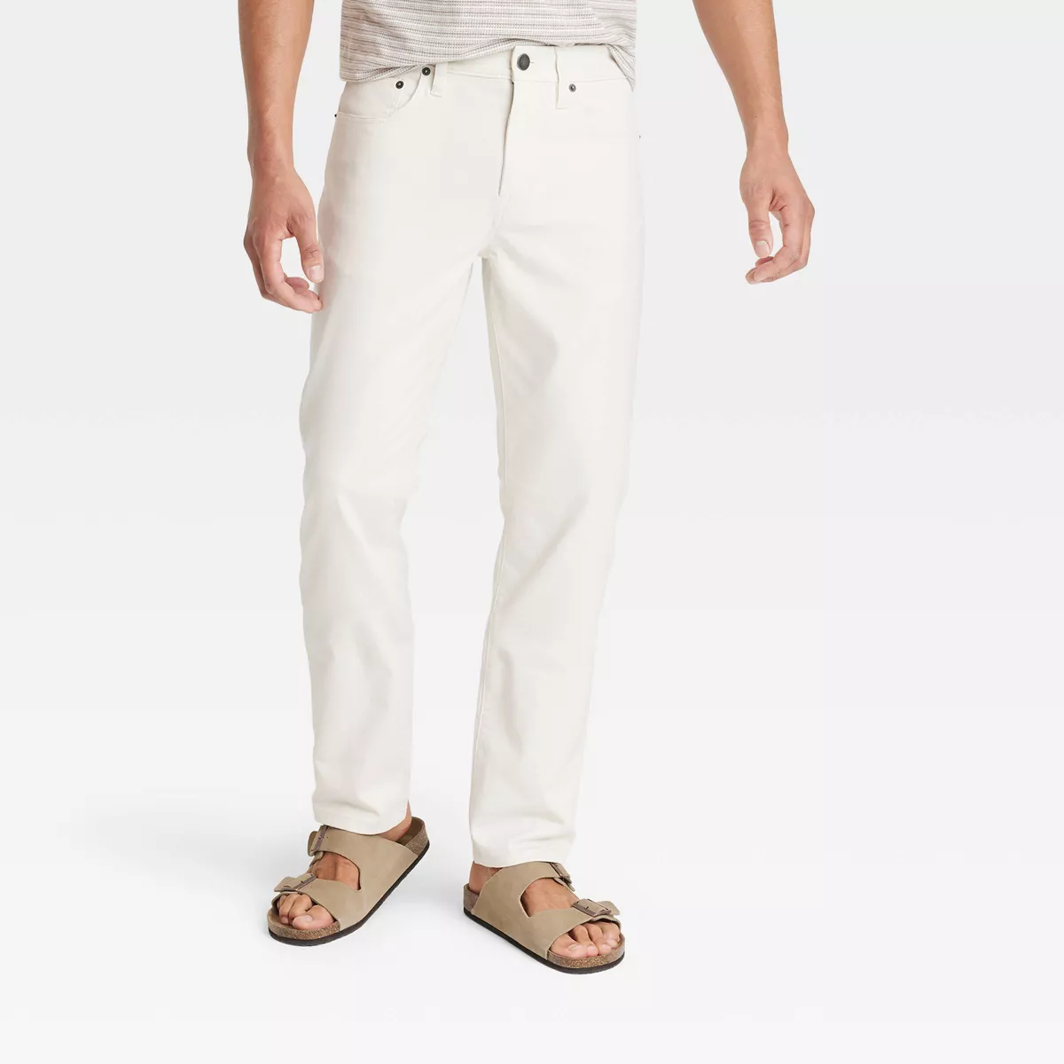 man wearing white jeans from target