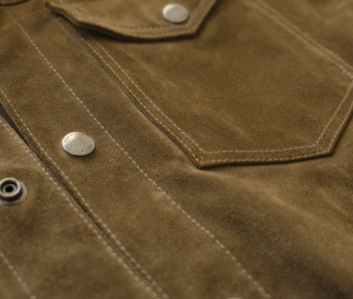 close up of the todd snyder suede jacket
