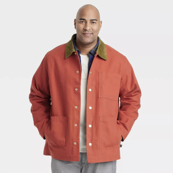 a man wearing a cord collar utility jacket