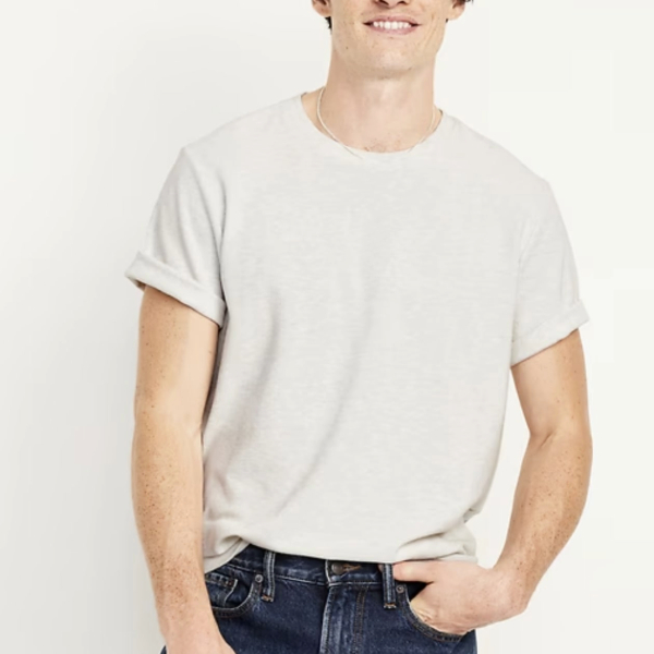 a man wearing a crew neck waffle knit shirt