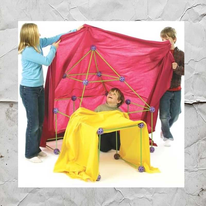Crazy forts 3 people putting blankets on a fort