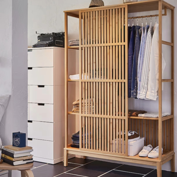 a wardrobe storage unit with sliding door, shelves, and clothes rail and featuring a sliding door