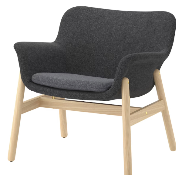a modern armchair with dark grey upholstrey and wooden legs