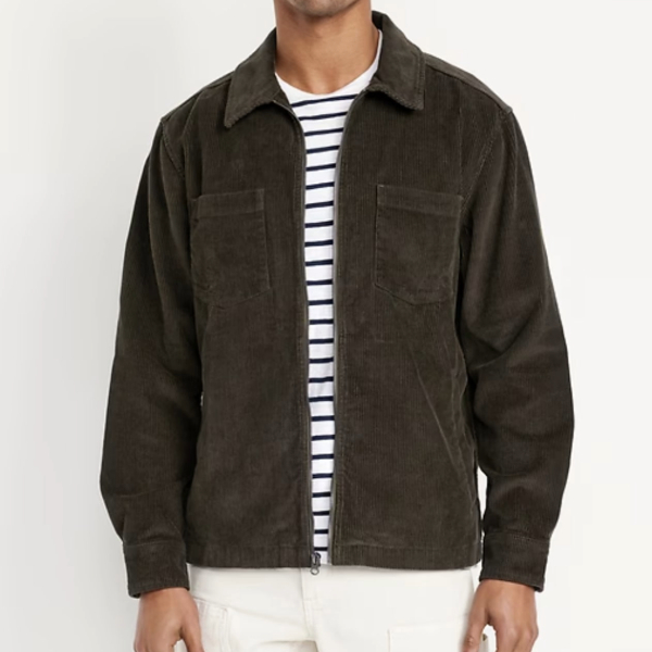 a man wearing a corduroy shirt over crew neck shirt and pants