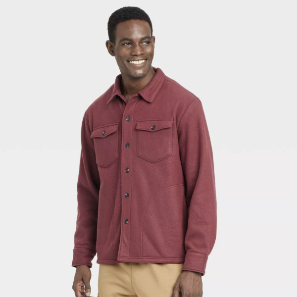 man wearing a long sleeve button front shirt jacket