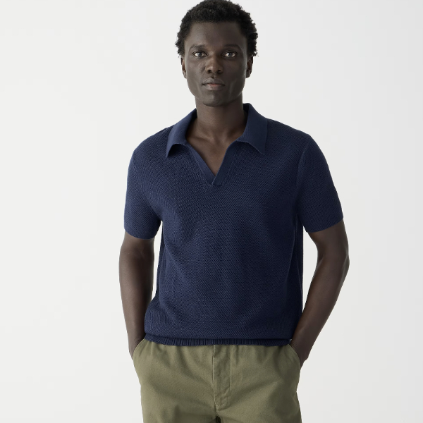 a man wearing a short sleeve johnny collar sweater polo shirt