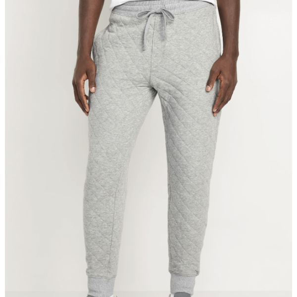 a man wearing quilted fleece joggers with drawstring waist