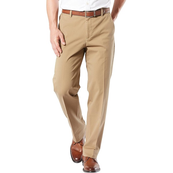 a man wearing classic fit khaki pants with loafer shoes