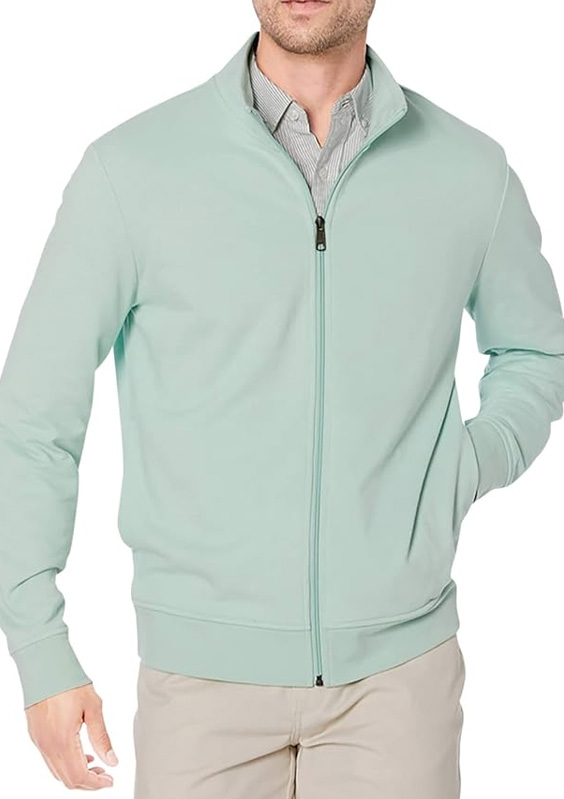 man wearing a full zip mock neck sweater