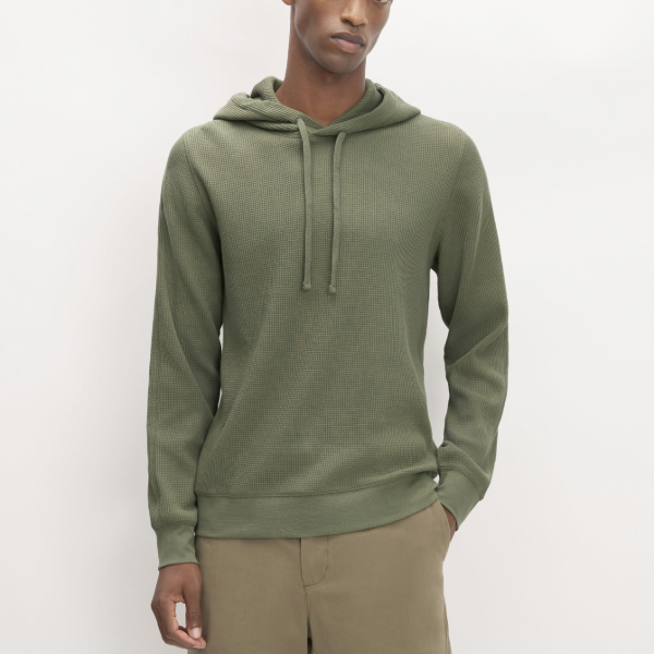 man wearing a waffle knit hoodie sweater