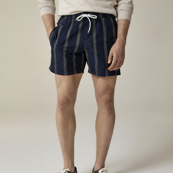 man wearing a 6" cotton-nylon blend swim trunk with drawstring waist