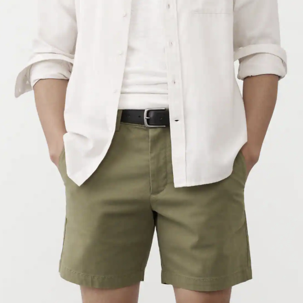man wearing a short with 7 inch inseam with a casual button front shirt