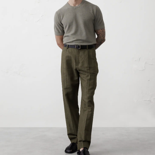man wearing a wide leg pant with a crew neck short sleeve shirt