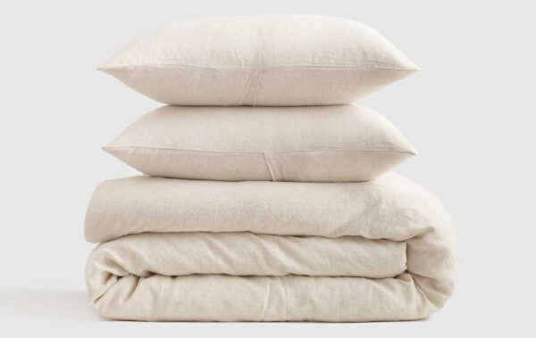 a linen duvet cover set including two shams