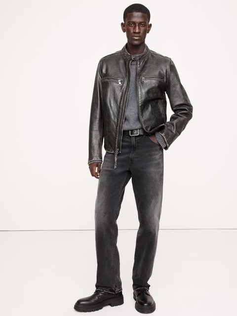 man wearing black straight fit jeans