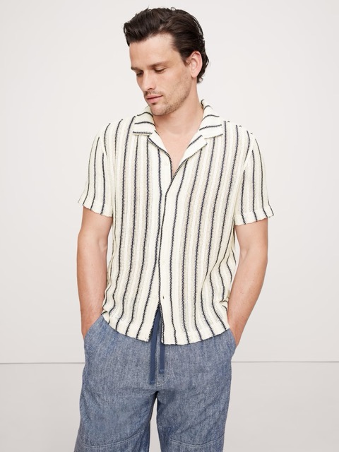 man wearing striped short sleeve shirt