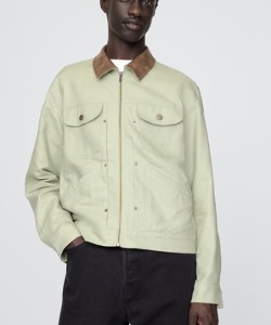 man wearing a linen cotton trucker style jacket