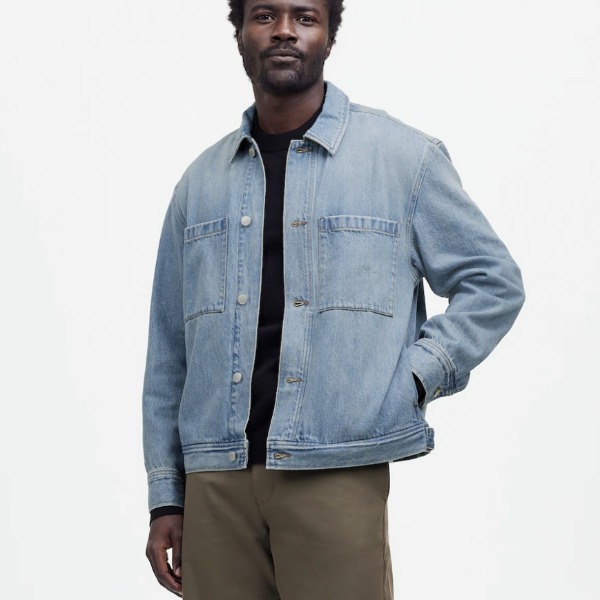 man wearing a denim shirt jacket and casual pants