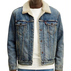 man wearing a denim trucke jacket with sherpa collar and lining