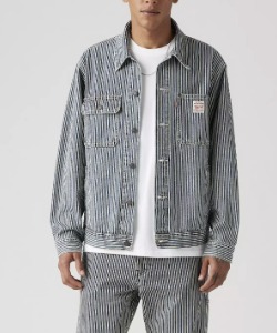 man wearing a work wear style striped trucker jacket