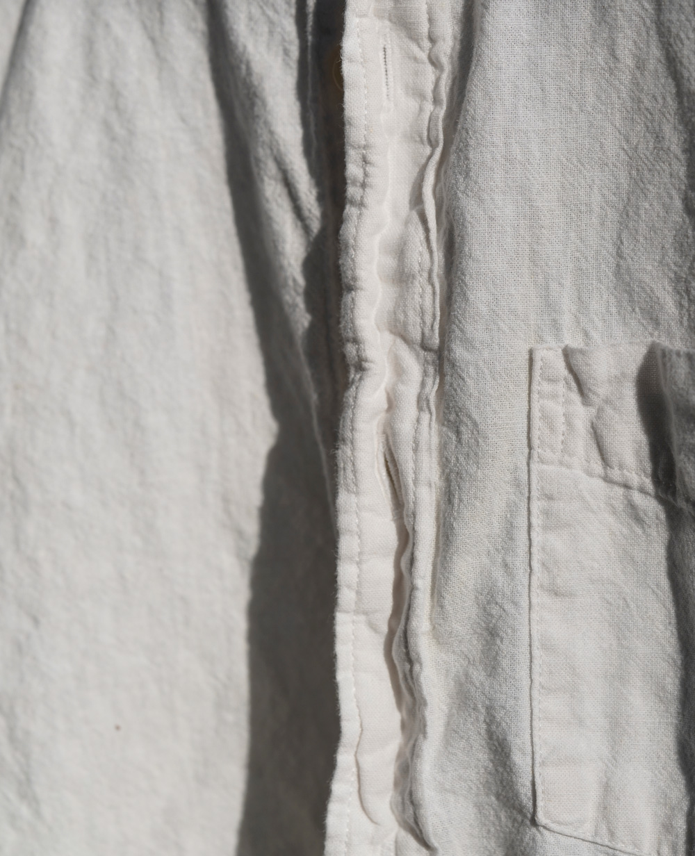 curled placket on a linen shirt