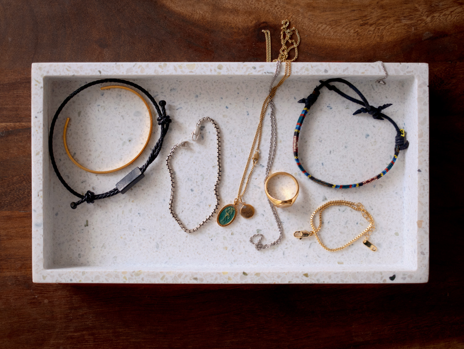 men's jewelry in a tray