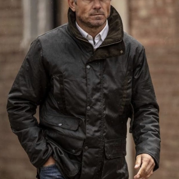 man wearing a hawthorne style jacket over a collared shirt