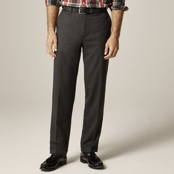 man wearing a creased wool trouser pant with dress shoes