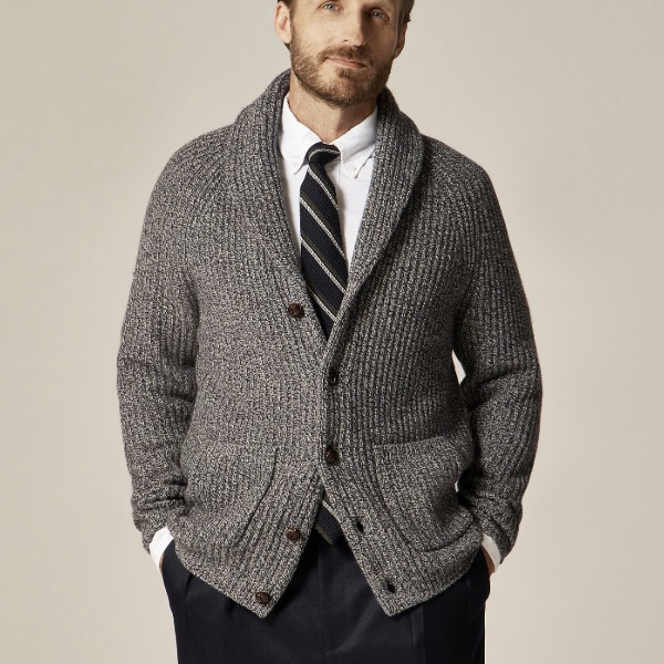 man wearing a shawl collar cardigan with a button up shirt and tie