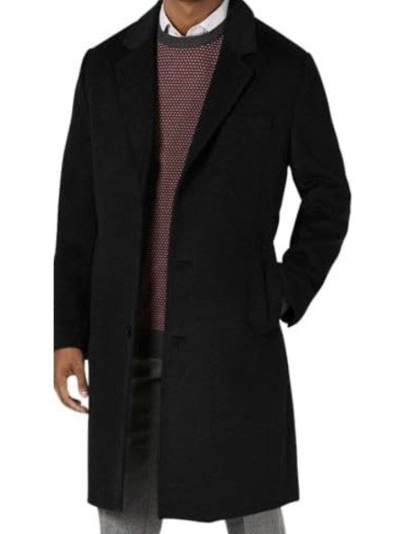 Untitled-7 man wearing a wool over coat over a crew neck sweater