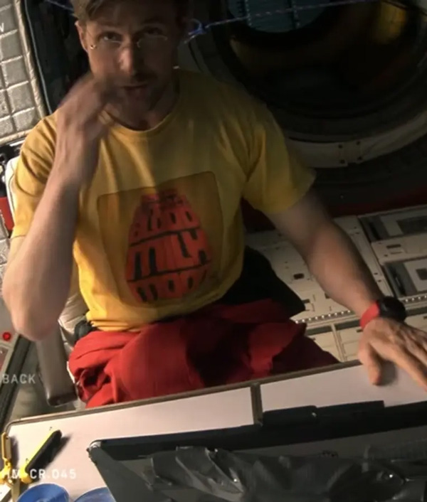 Ryan Gosling wearing Hermanos Gutiérrez band t-shirt in Project Hail Mary