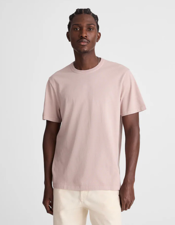 man wearing light pink tshirt